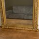 Late 19th century gilded mirror with decorated pediment 125x70cm