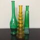 Series of 3 green and yellow glass vases