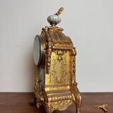 Napoleon III clock in gilded bronze and porcelain plates decorated and painted by hand