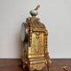 Napoleon III clock in gilded bronze and porcelain plates decorated and painted by hand
