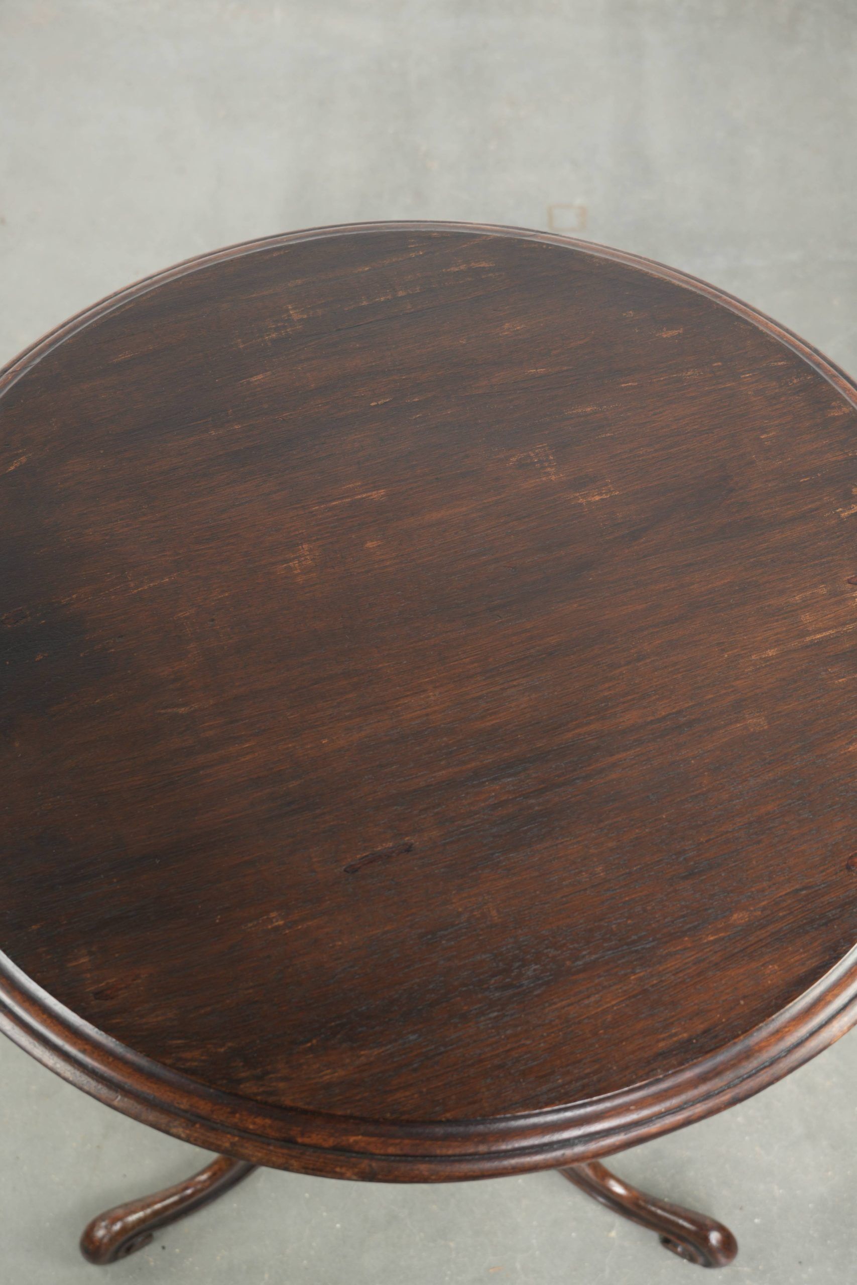 Round antique side table / wine table with rich carvings