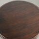 Round antique side table / wine table with rich carvings
