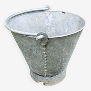 Old riveted zinc bucket