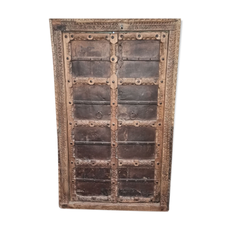 Old wooden door with frame