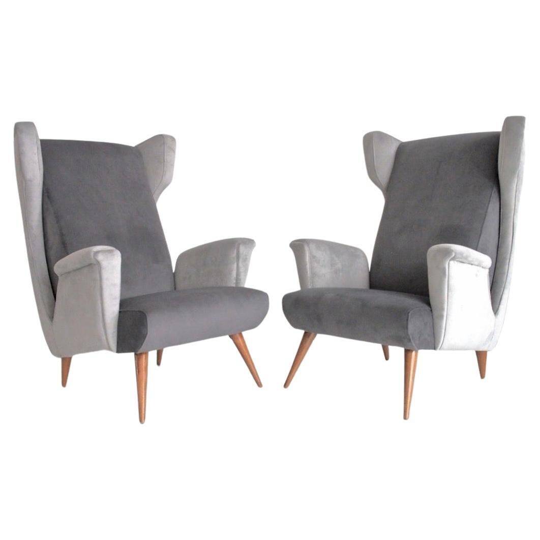 Pair of grey velvet armchairs in the style of Gio Ponti.