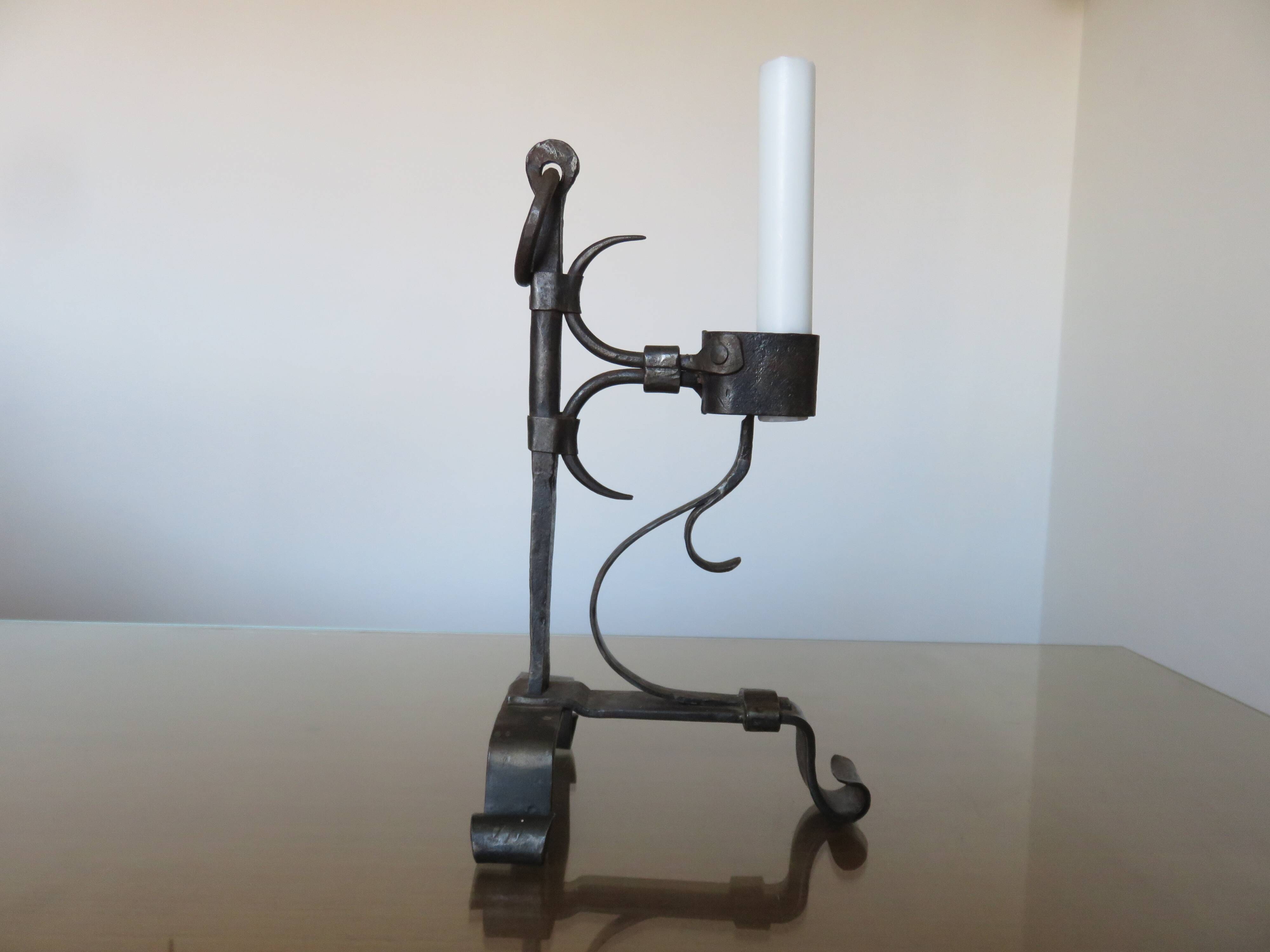 Brutalist candlestick in blackened wrought iron from the 1940s-50s.