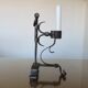 Brutalist candlestick in blackened wrought iron from the 1940s-50s.