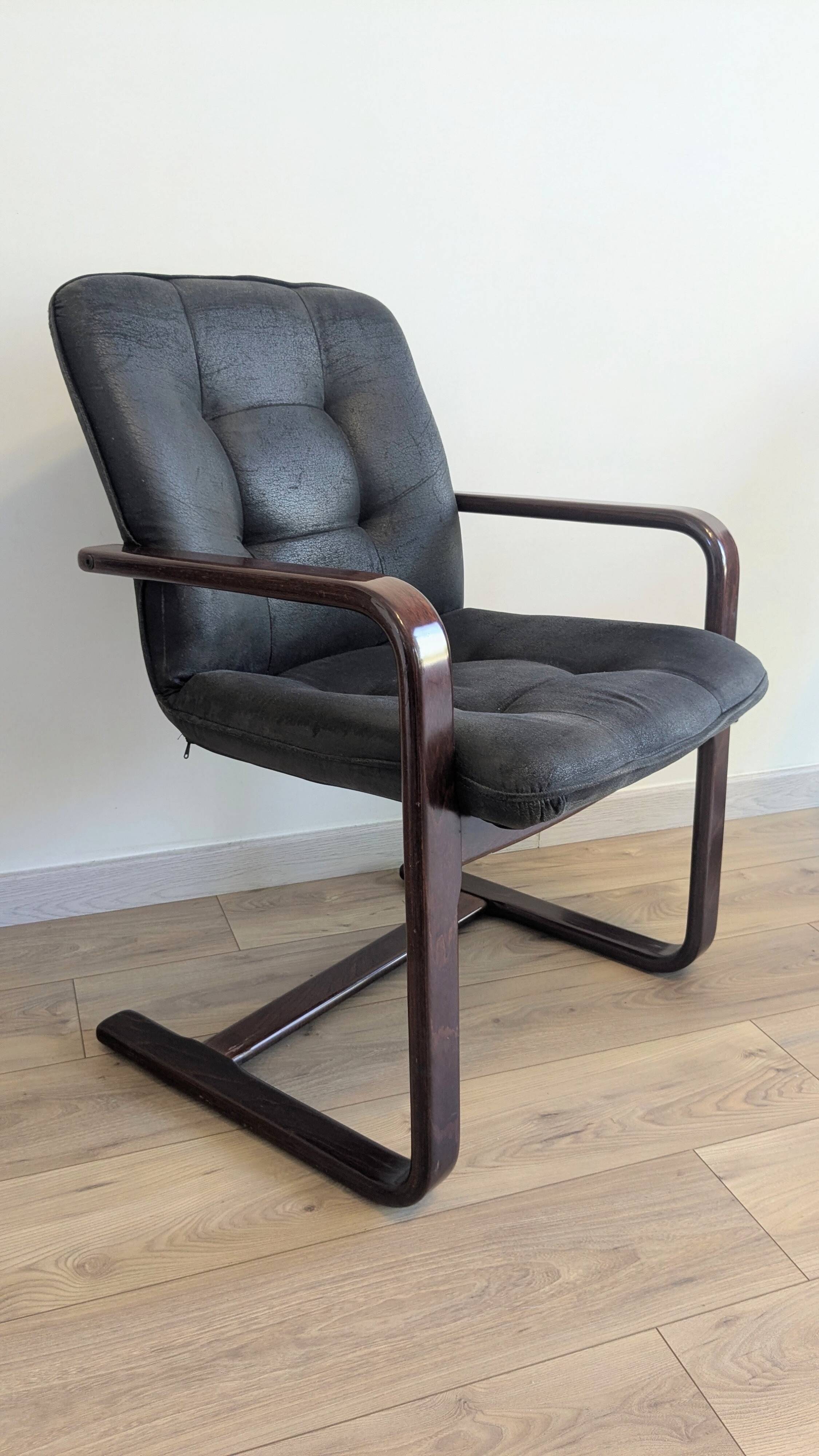 Pair of vintage cantilever armchairs in rosewood veneer.