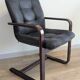 Pair of vintage cantilever armchairs in rosewood veneer.