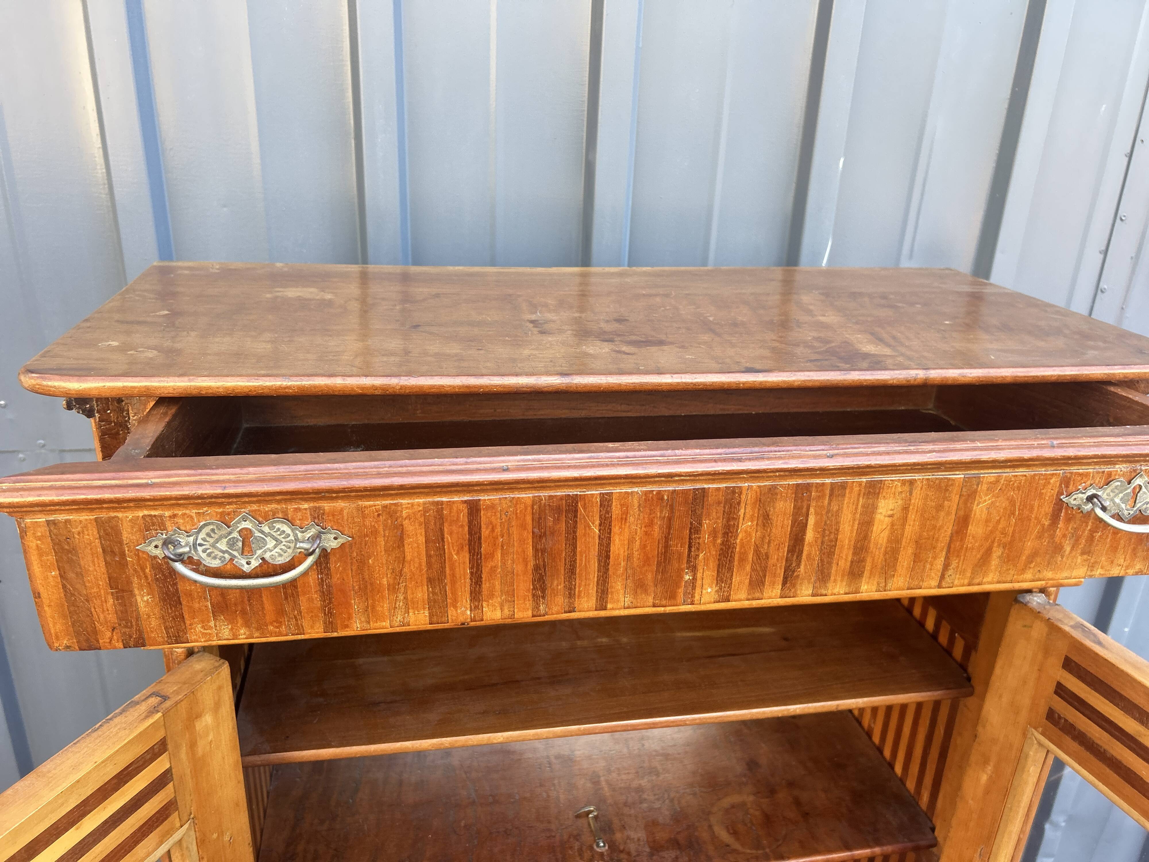 Two-door mahogany display cabinet