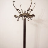 Brass revolving coat holder