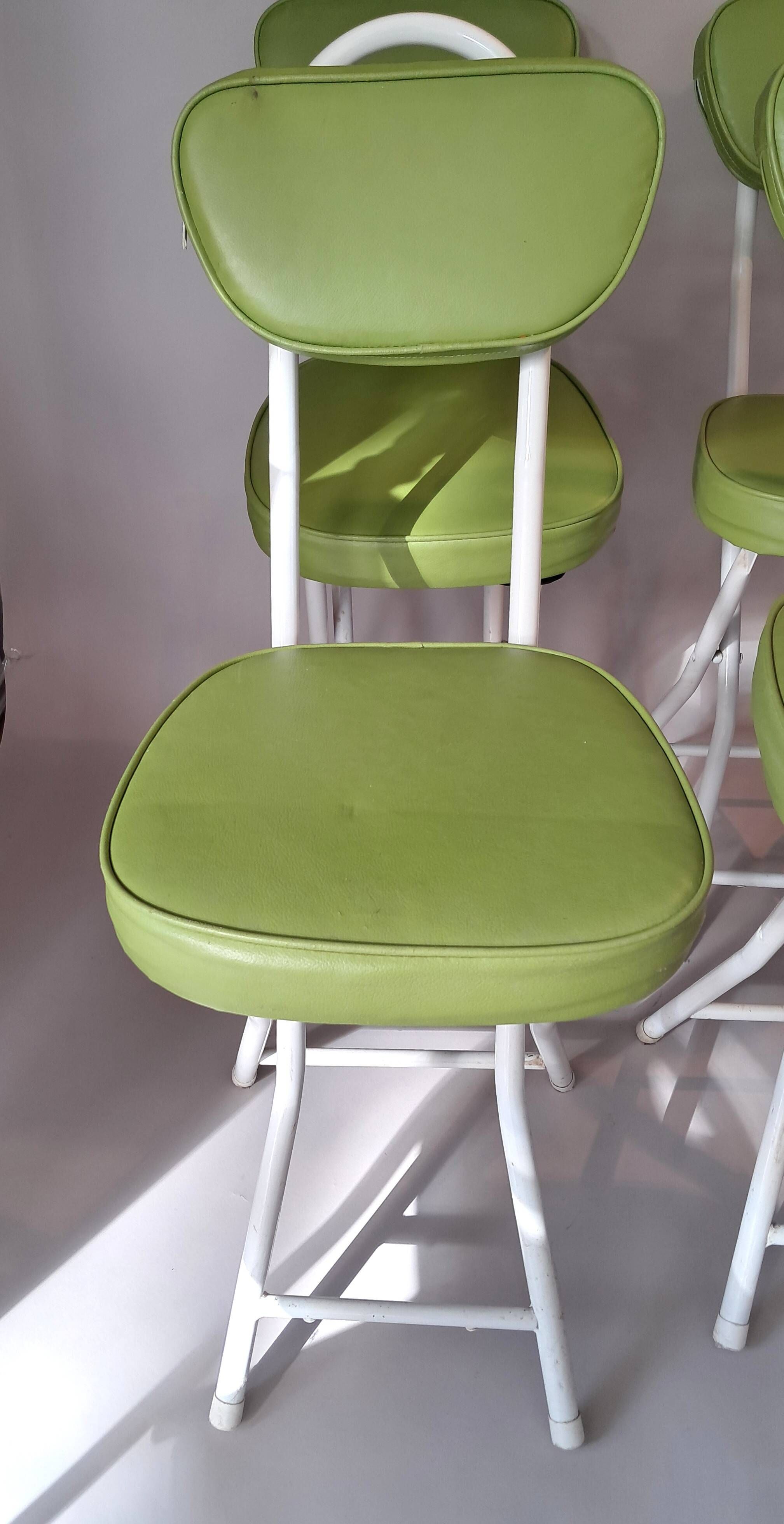 Set of 4 folding cocktail chairs in olive green faux leather from the 1970s.