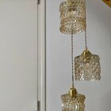 Triple antique globe pendant light in amber glass