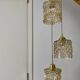 Triple antique globe pendant light in amber glass