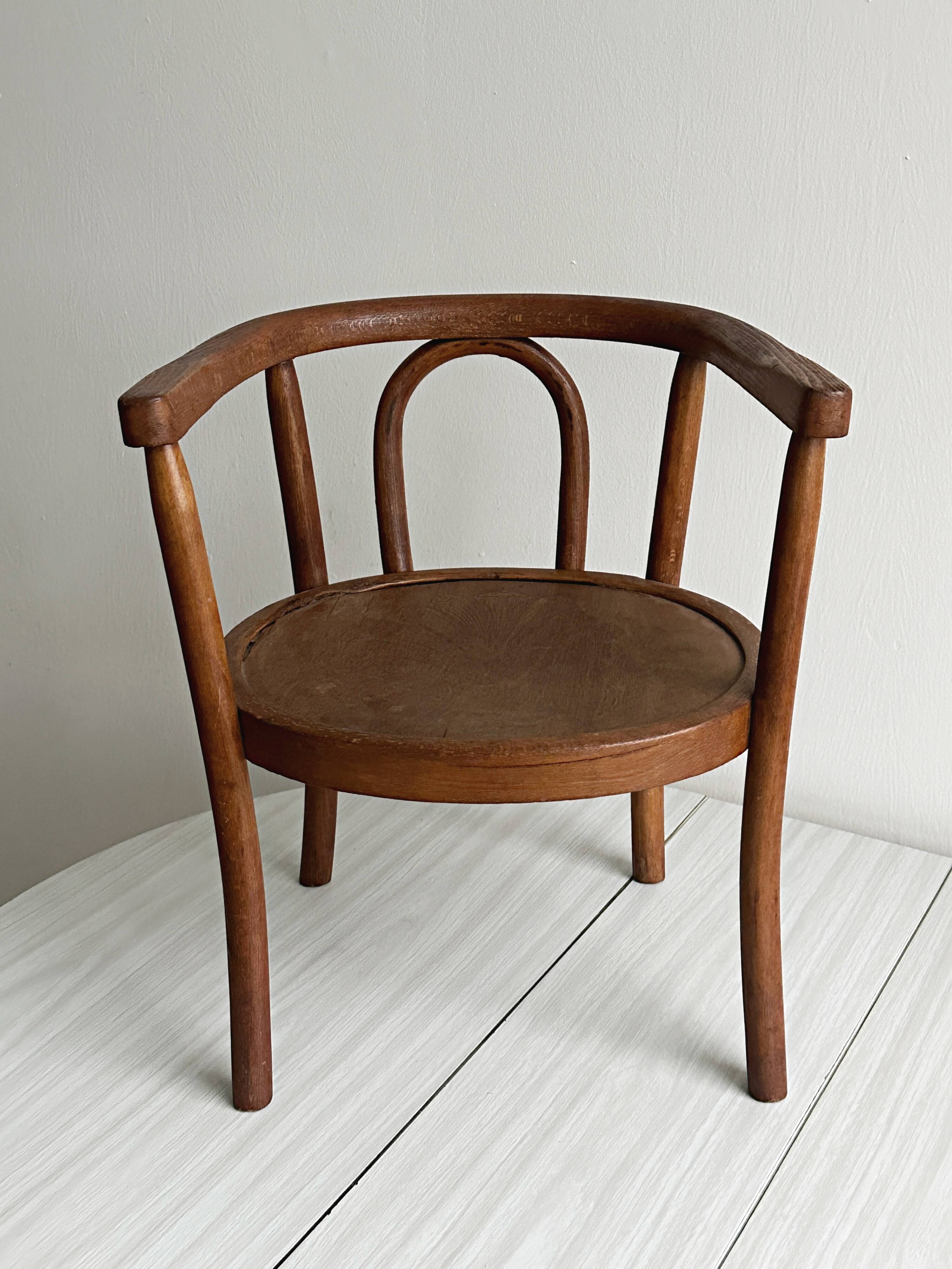 vintage curved wooden children's chair