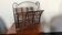 Metal and woven rattan magazine rack from the 60s.