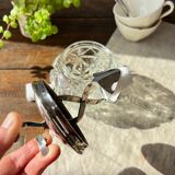 Glass and metal clamp