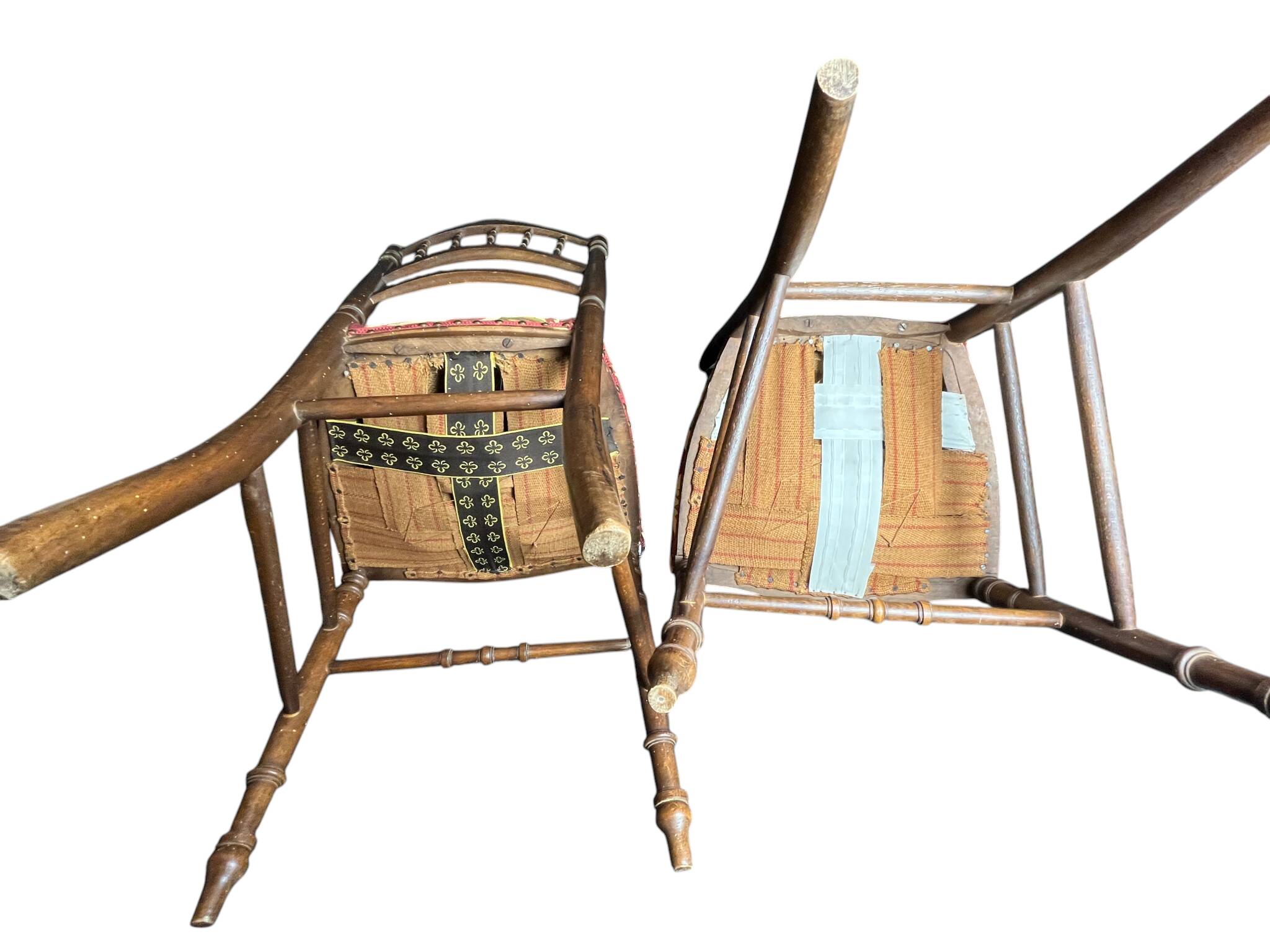 Two floral upholstered music chairs from the early 20th century.