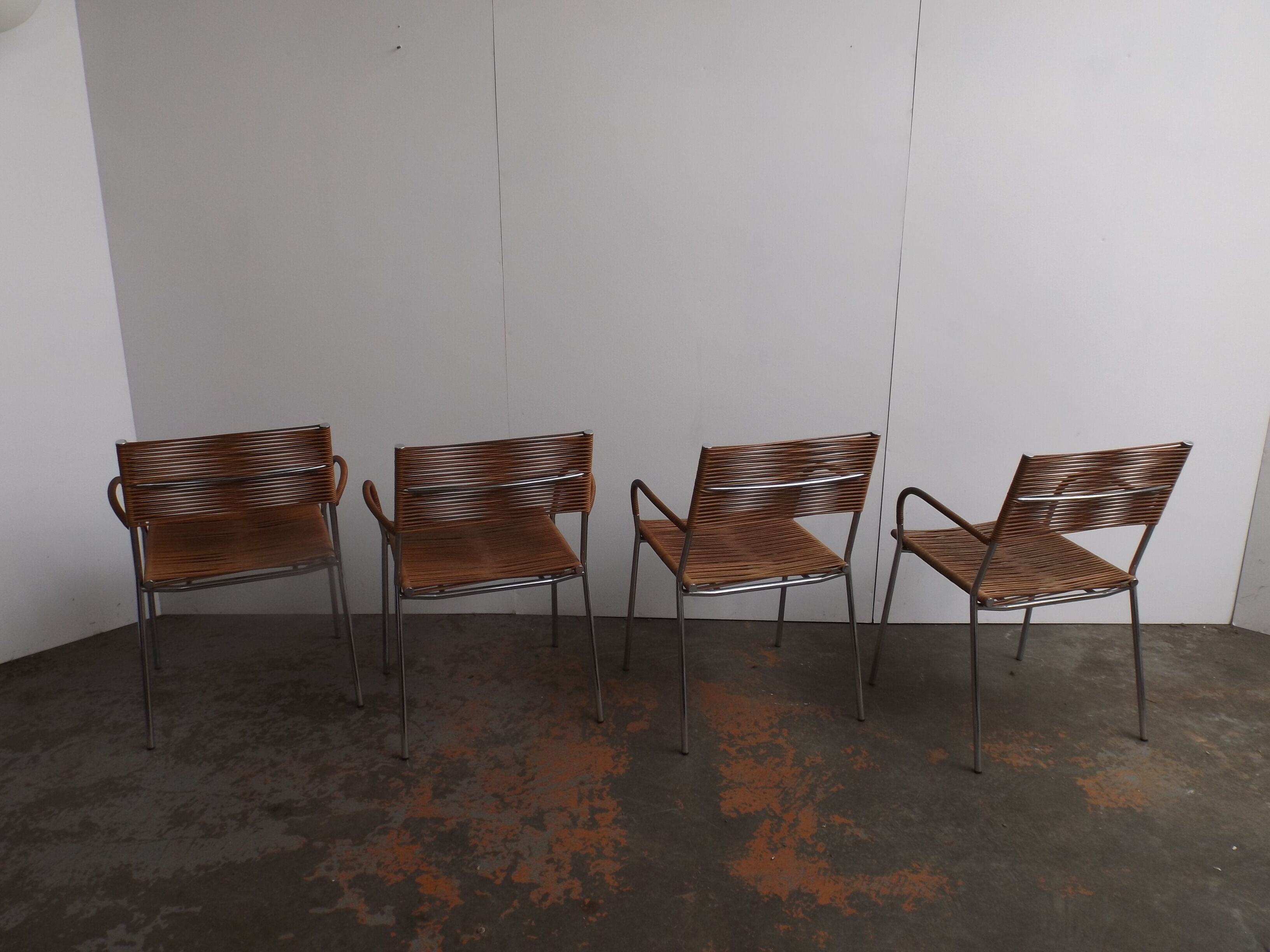Set of 4 chairs by Tito Agnoli