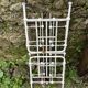 Old wrought iron doll bed