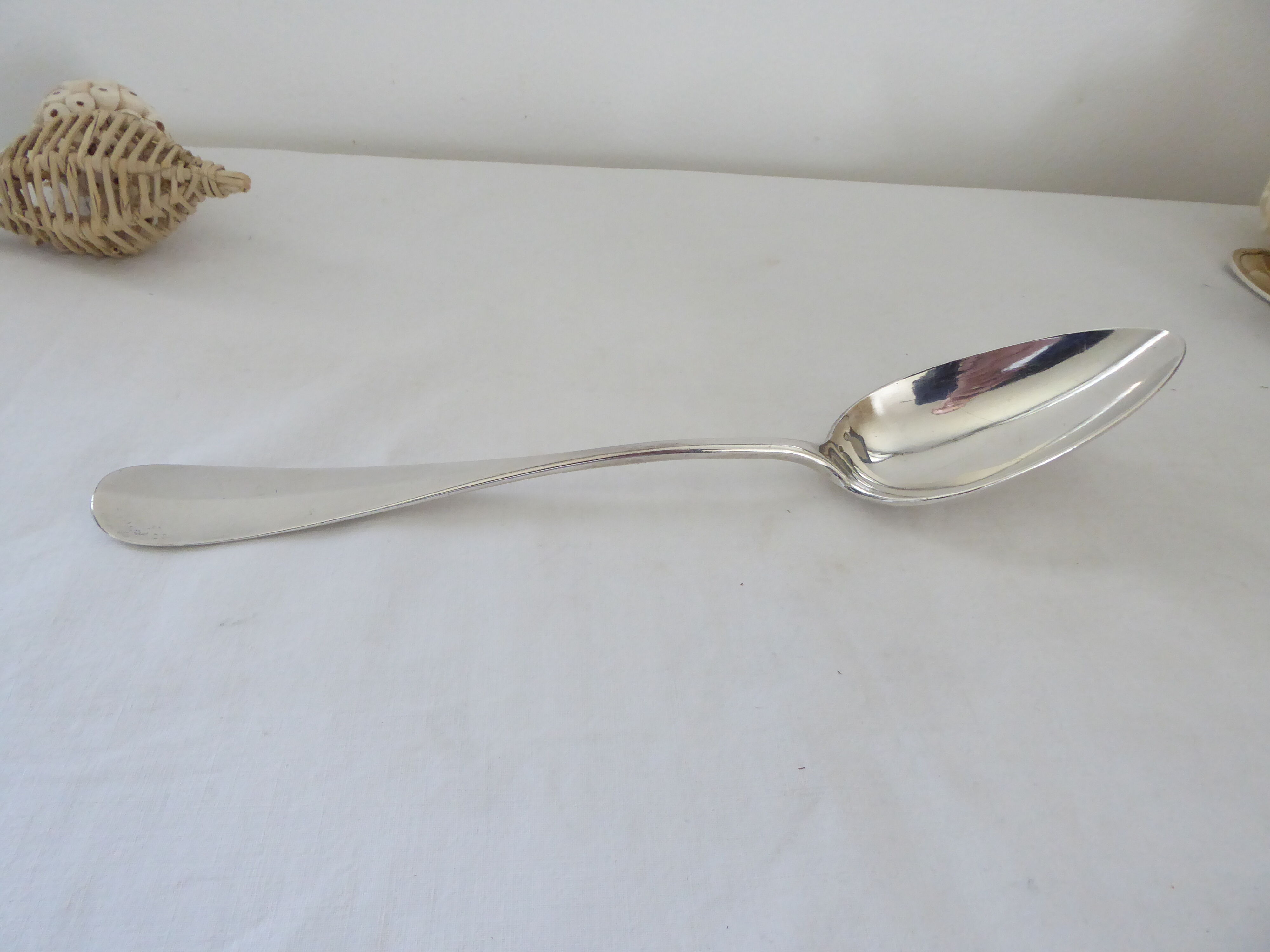 Silver metal serving spoon