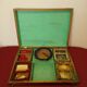 Old mahogany game box with bone tokens, XIXth century