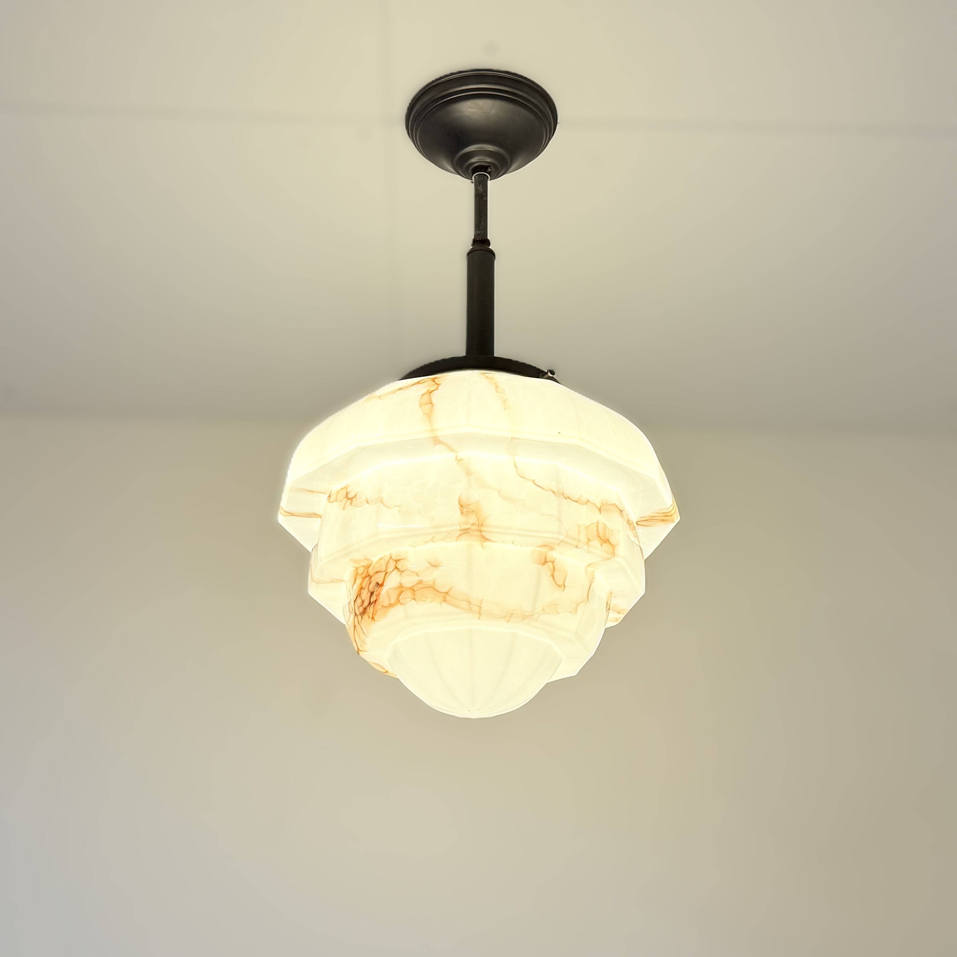 Art Deco pendant lamp with marbled glass shade