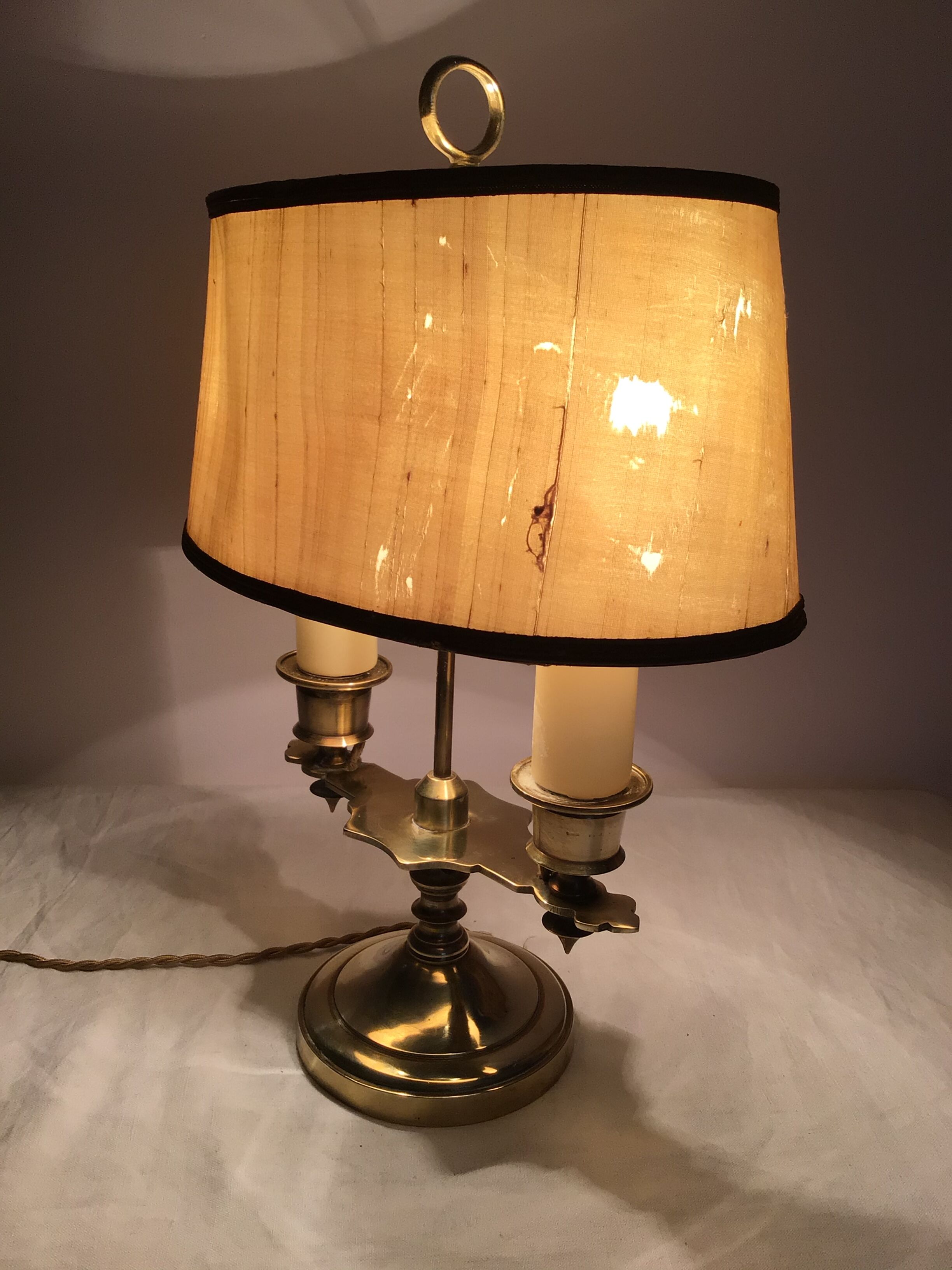 Old golden brass hot water bottle lamp with 2 arms of light