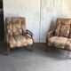 Pair of Art Deco armchairs from the 1930s in brown fabric and carved wood — vintage style