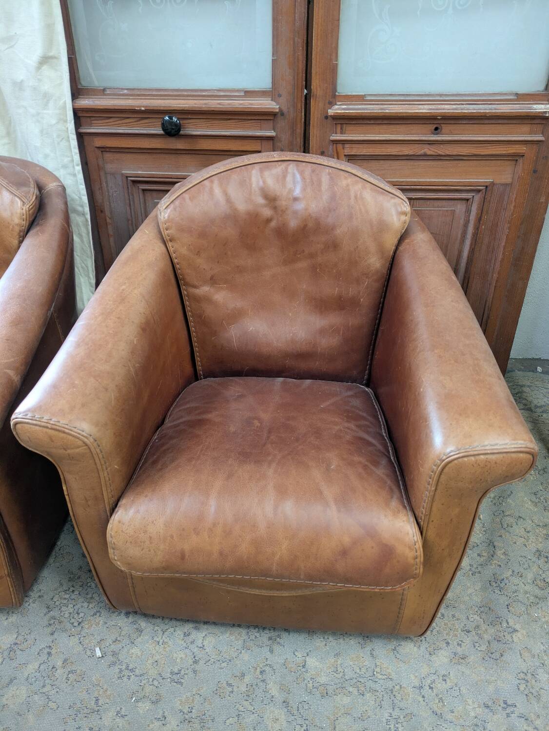 Pair of leather armchairs