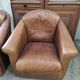 Paire de fauteuils cuir