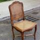 2 Louis XV style chairs in solid oak with rush seating from La Meublerie Meulin.