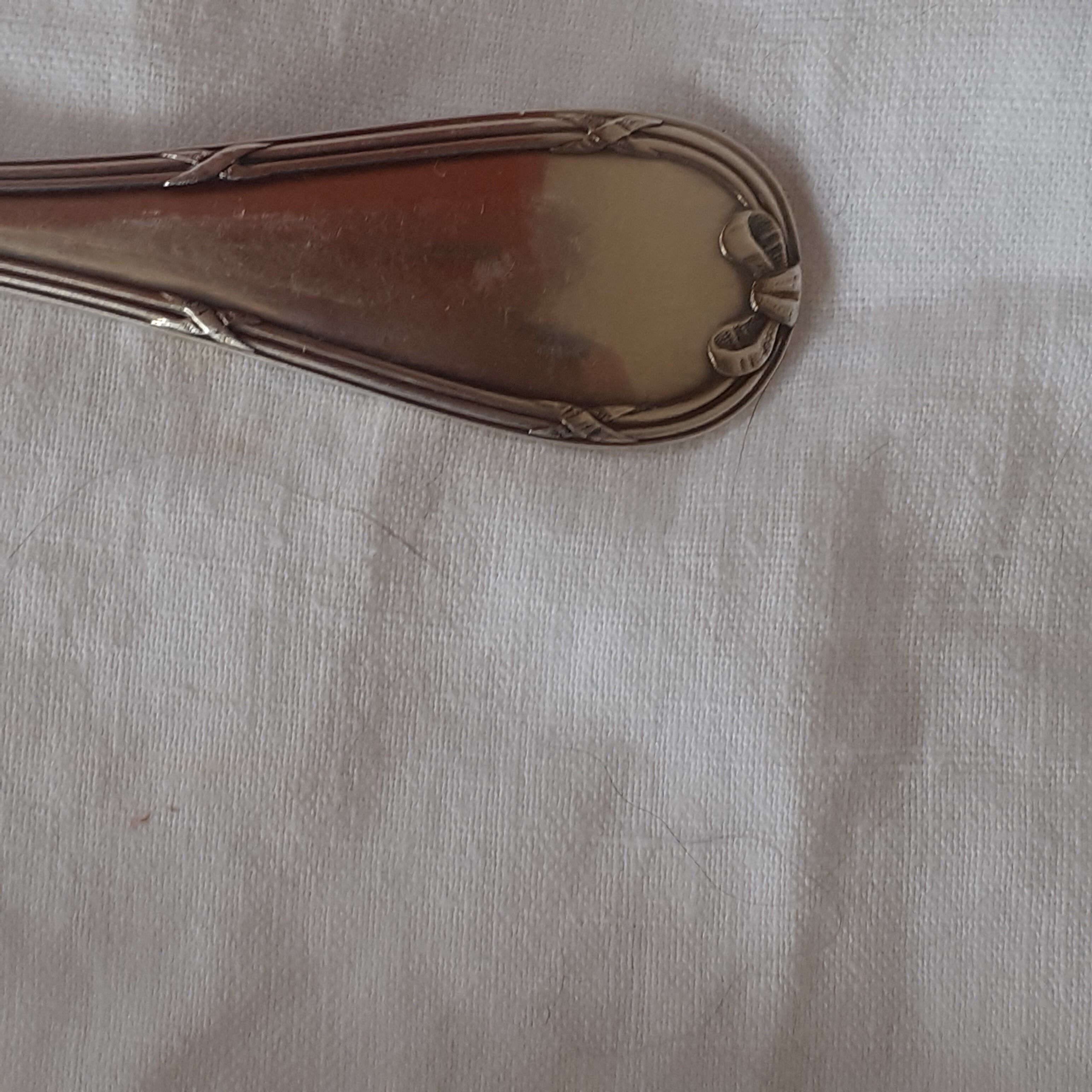 12 Christofle cake spoons. Ribbon template.
