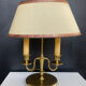 Directoire style bouillotte lamp in brass with double lights.