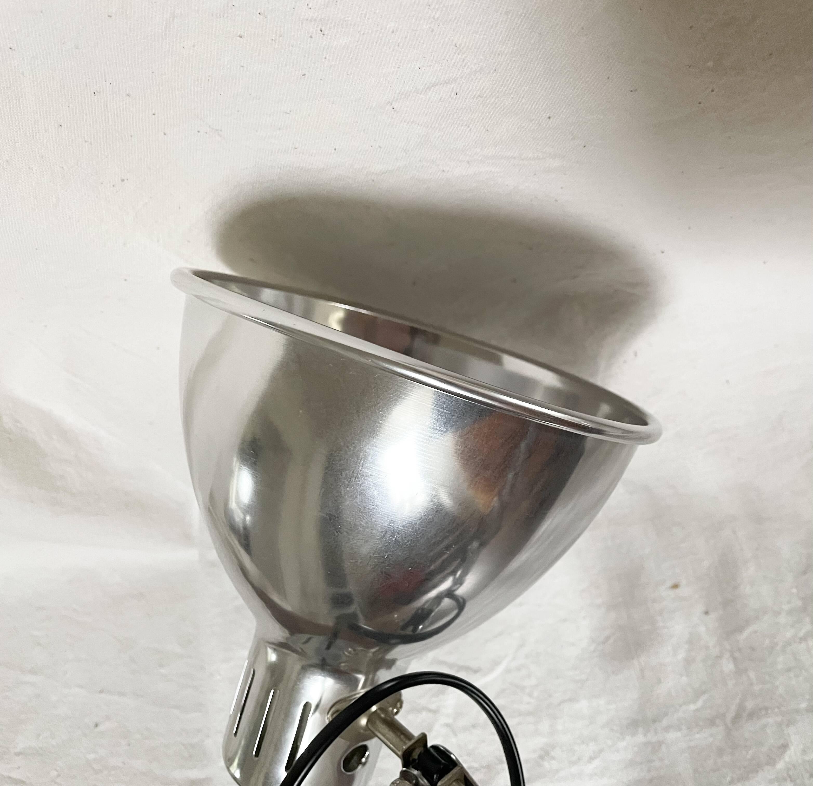 Vintage accordion wall light in chrome metal.