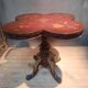 Guéridon with a polylobed top in Far Eastern lacquer.