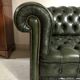 Patinated green English Chesterfield sofa