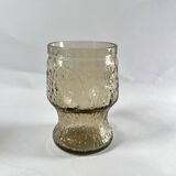 Brown water glasses decorated with citrus slices