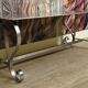Riveted metal industrial coffee table, Jansen style