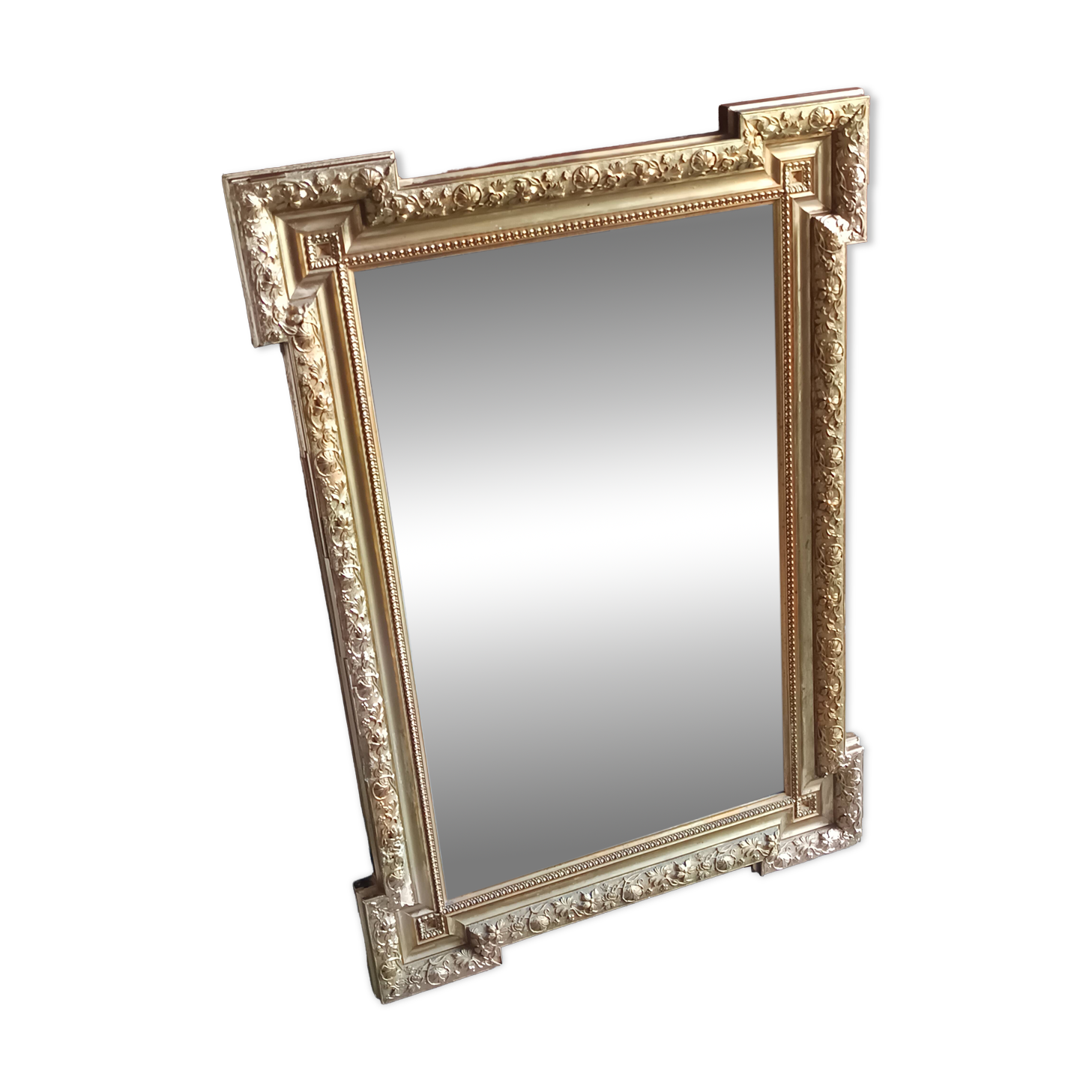 Antique mirror in wood and gilded stucco, neo Louis XVI style.