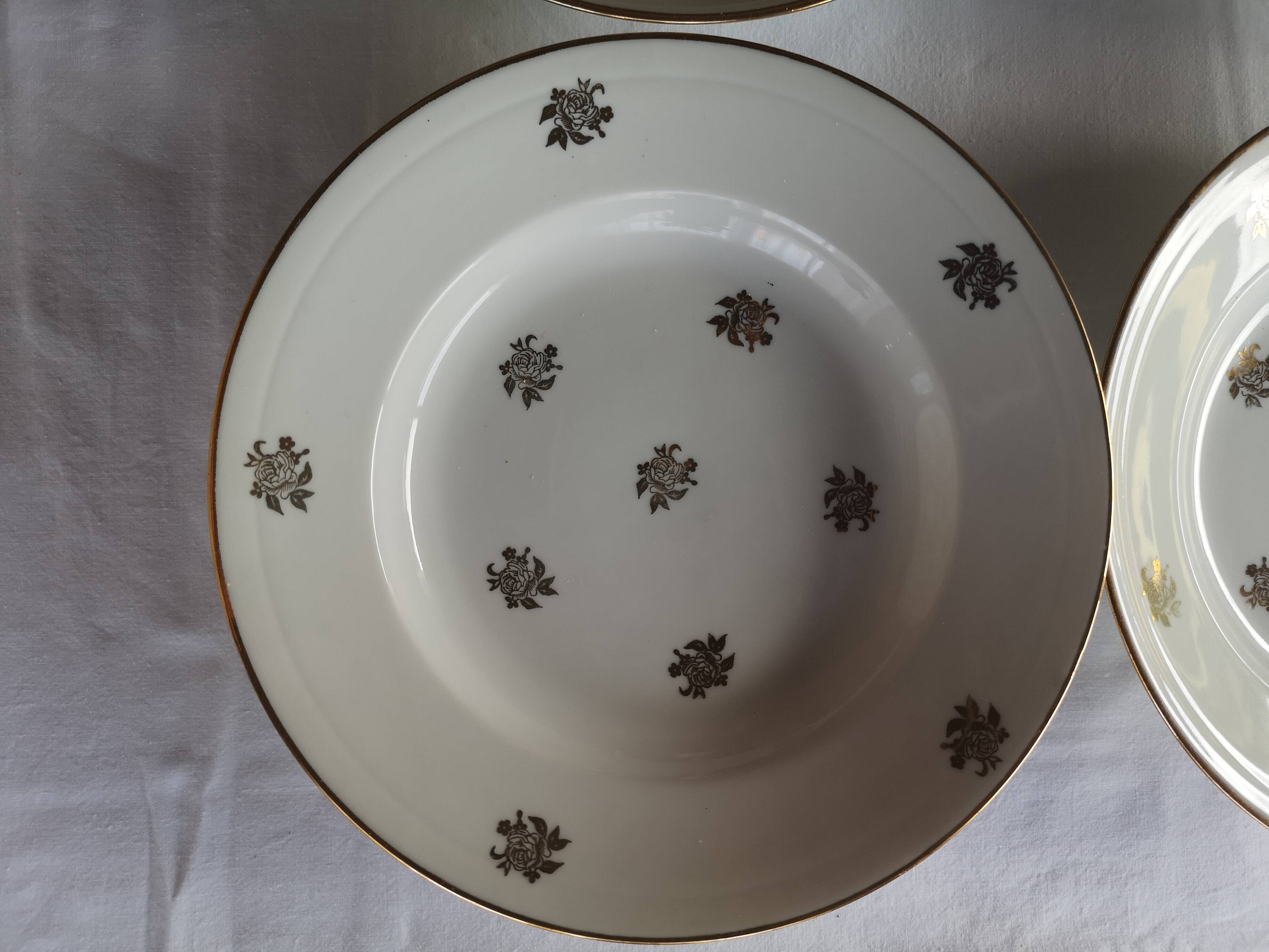 12 antique deep plates in French porcelain