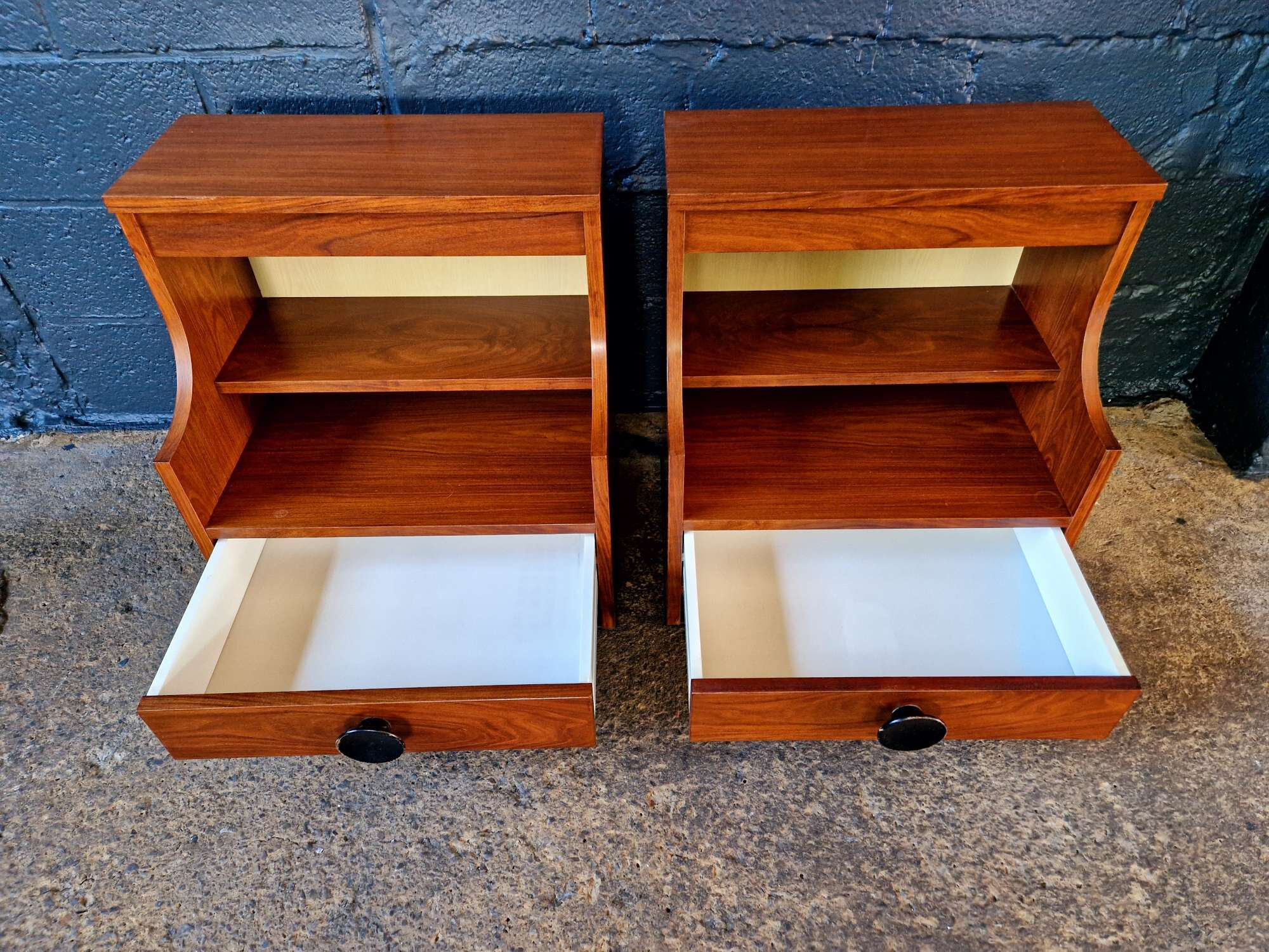 Pair of rosewood bedside tables, 1960s-70s