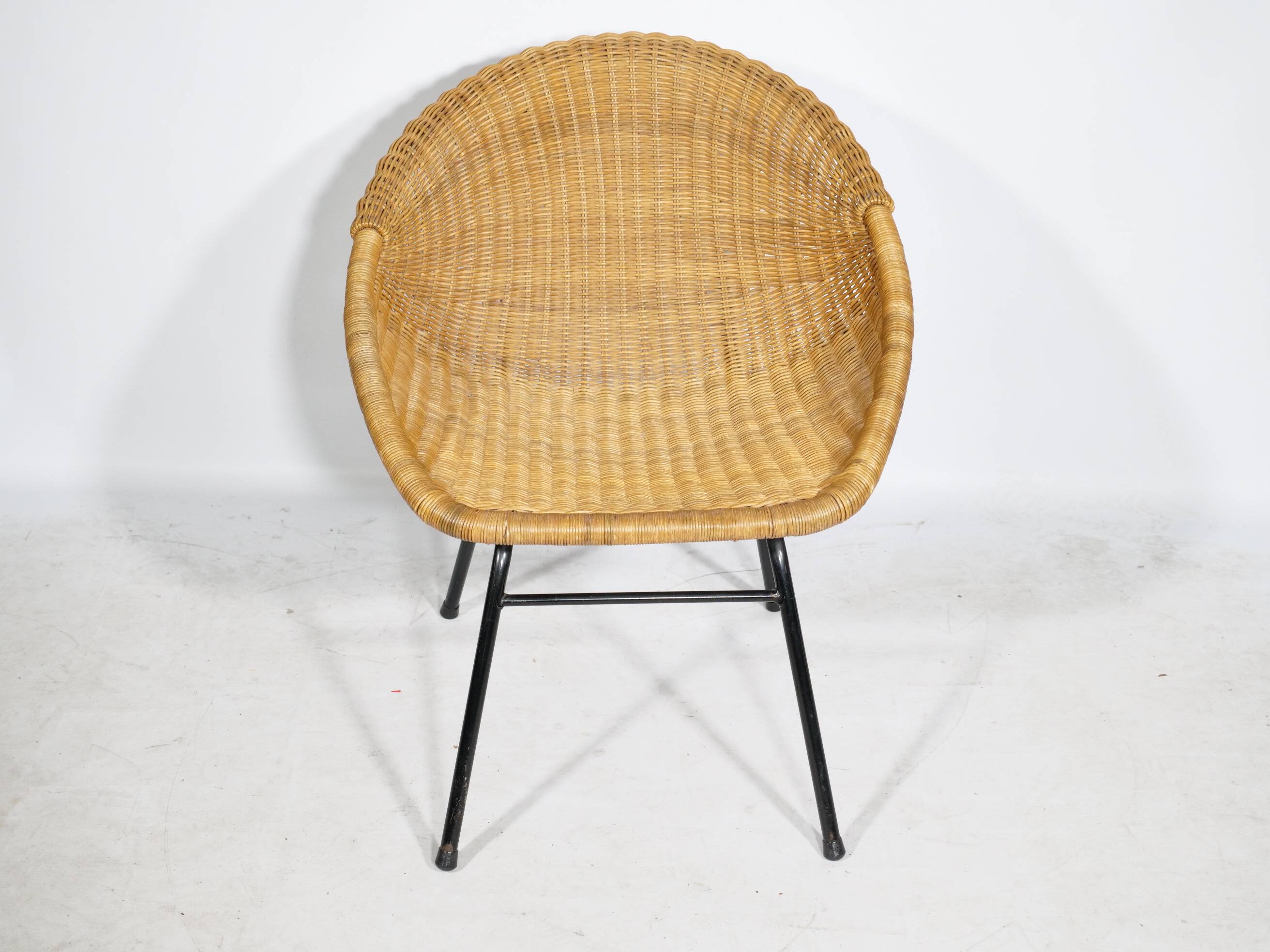 Woven rattan armchair from the 1960s