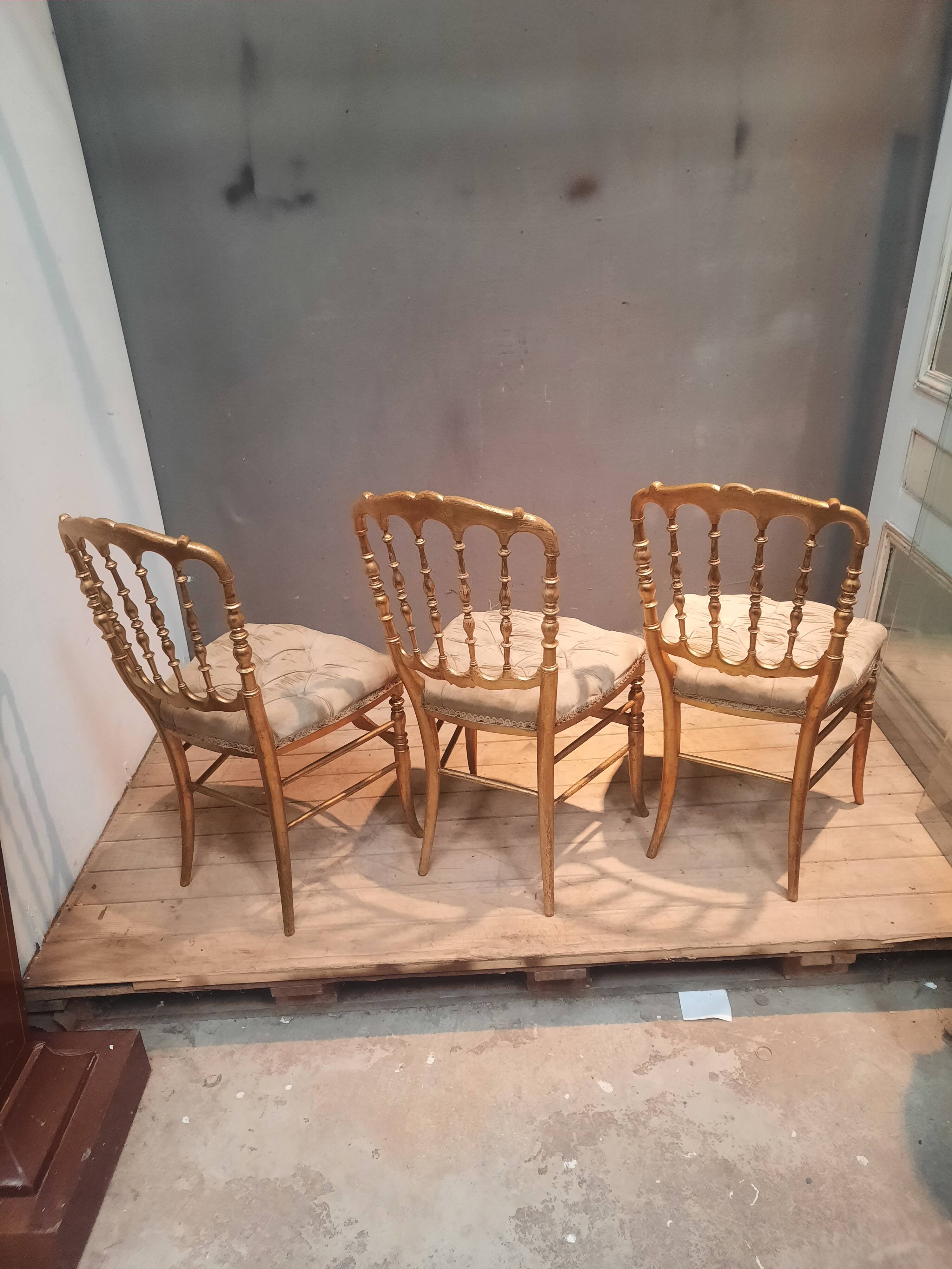 Set of 3 Napoleon III chairs in gilded wood