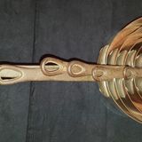 Series of 7 copper saucepans for decoration.