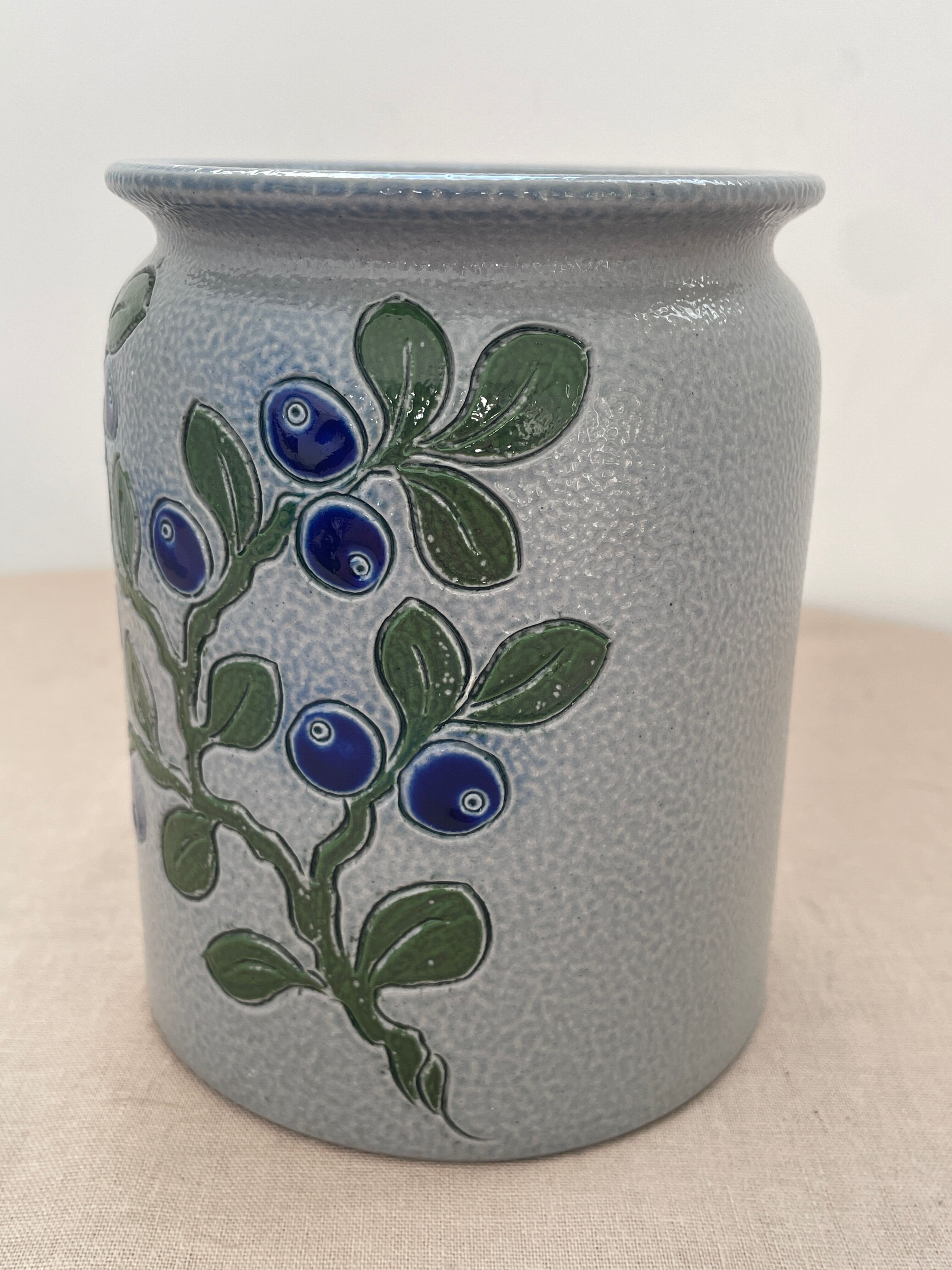 Vintage stoneware pot from Betschdorf signed TA Gilbert with olive decoration.