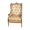 Armchair richly carved Louis XVI style