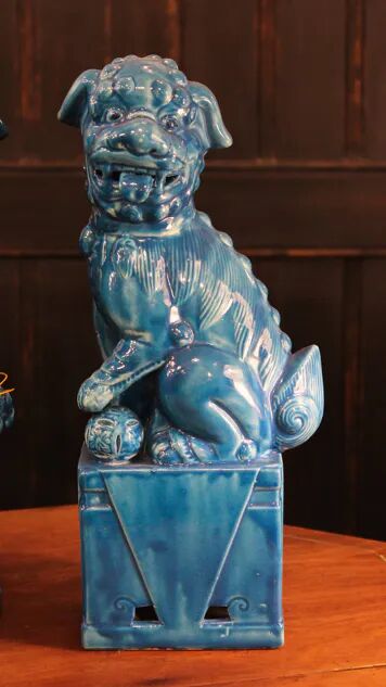 Pair of Foo dog bookends in turquoise glazed ceramic, Manises