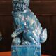 Pair of Foo dog bookends in turquoise glazed ceramic, Manises
