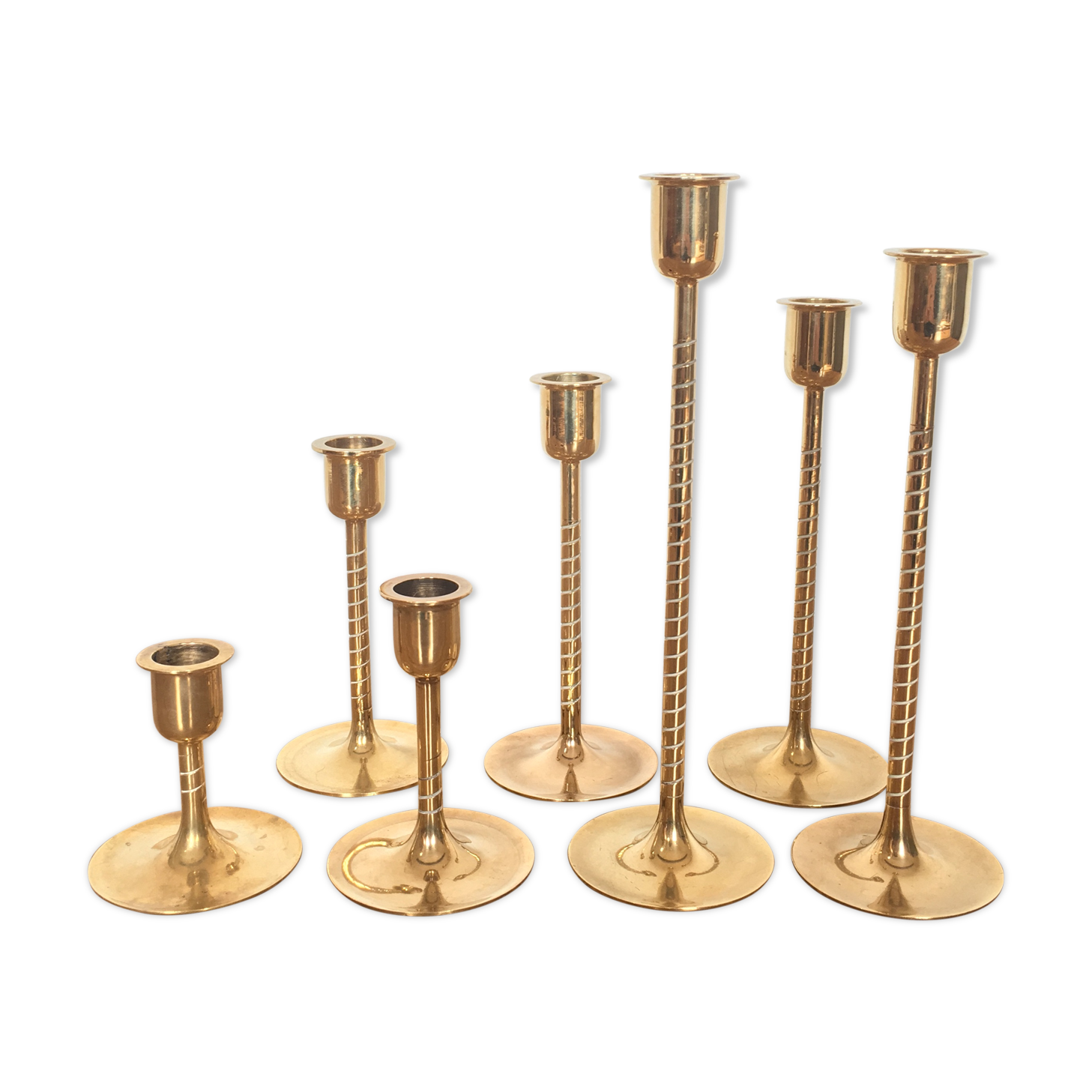 Series of 7 Scandinavian brass candlesticks